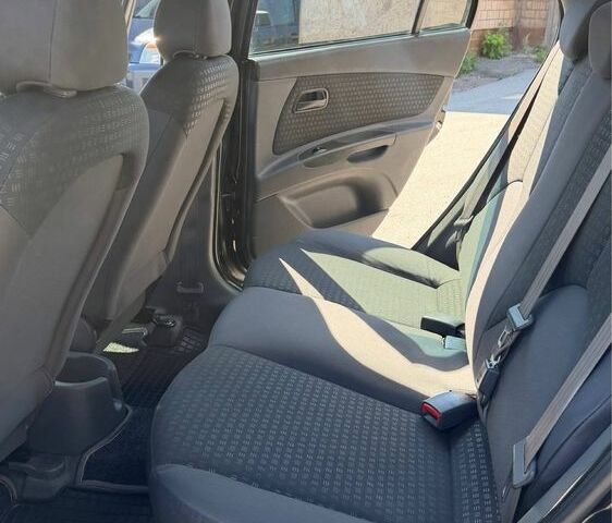 Черный Киа Рио, объемом двигателя 1.4 л и пробегом 235 тыс. км за 3200 $, фото 20 на Automoto.ua