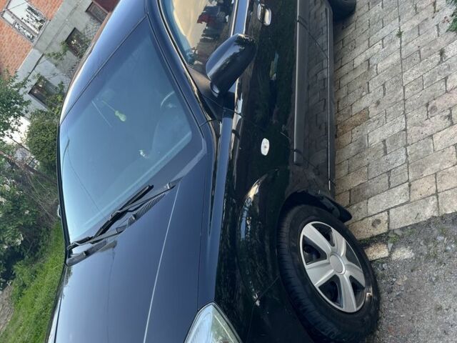 Черный Киа Рио, объемом двигателя 1.4 л и пробегом 249 тыс. км за 3500 $, фото 4 на Automoto.ua