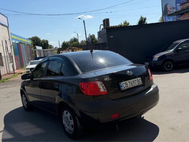 Черный Киа Рио, объемом двигателя 1.4 л и пробегом 235 тыс. км за 3200 $, фото 6 на Automoto.ua