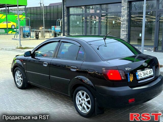 Чорний Кіа Ріо, об'ємом двигуна 1.4 л та пробігом 230 тис. км за 5800 $, фото 6 на Automoto.ua