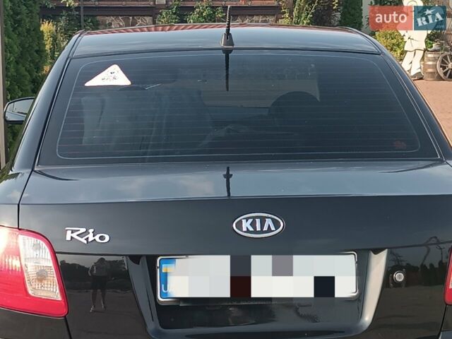 Черный Киа Рио, объемом двигателя 1.4 л и пробегом 196 тыс. км за 4200 $, фото 3 на Automoto.ua