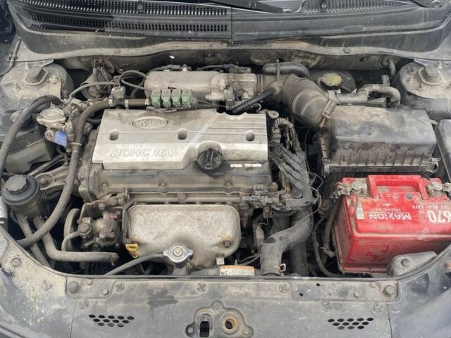 Чорний Кіа Ріо, об'ємом двигуна 1.4 л та пробігом 358 тис. км за 3750 $, фото 9 на Automoto.ua