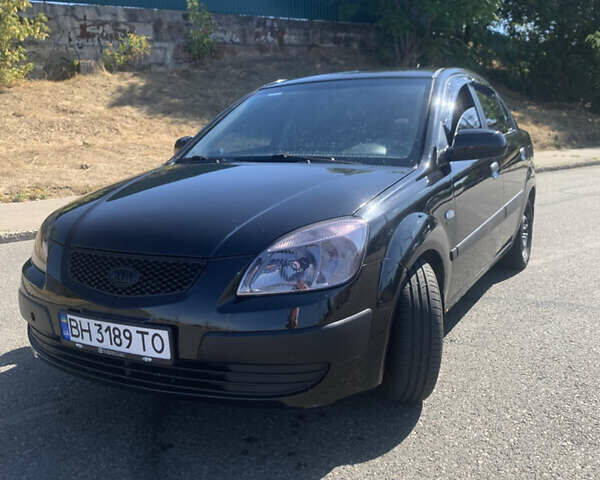 Чорний Кіа Ріо, об'ємом двигуна 1.5 л та пробігом 261 тис. км за 3700 $, фото 5 на Automoto.ua