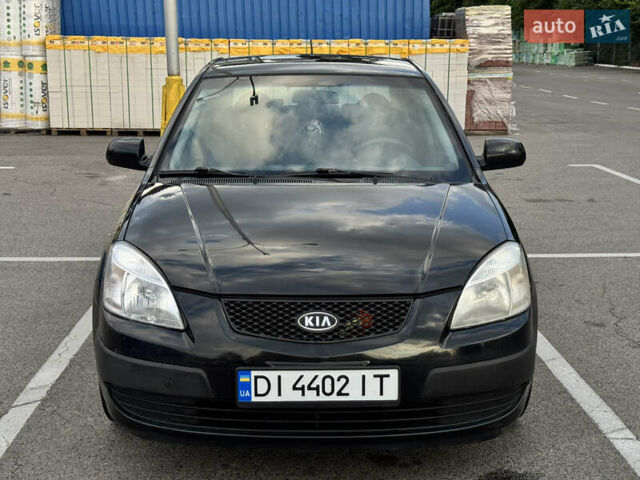 Черный Киа Рио, объемом двигателя 1.4 л и пробегом 225 тыс. км за 5000 $, фото 1 на Automoto.ua
