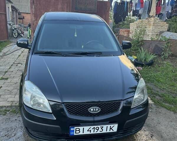 Чорний Кіа Ріо, об'ємом двигуна 1.4 л та пробігом 249 тис. км за 3500 $, фото 4 на Automoto.ua