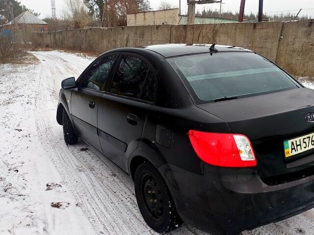 Черный Киа Рио, объемом двигателя 1.4 л и пробегом 760 тыс. км за 2500 $, фото 2 на Automoto.ua
