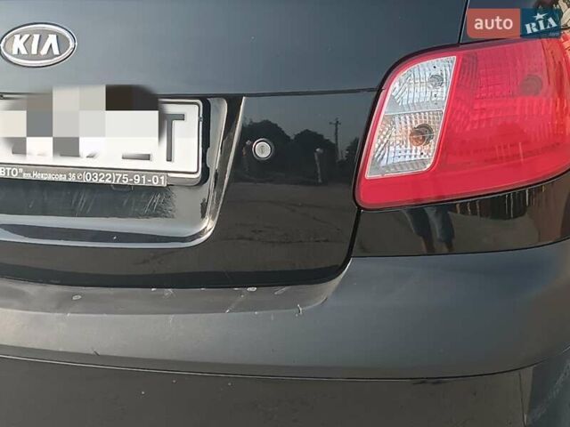 Черный Киа Рио, объемом двигателя 1.4 л и пробегом 196 тыс. км за 4800 $, фото 1 на Automoto.ua