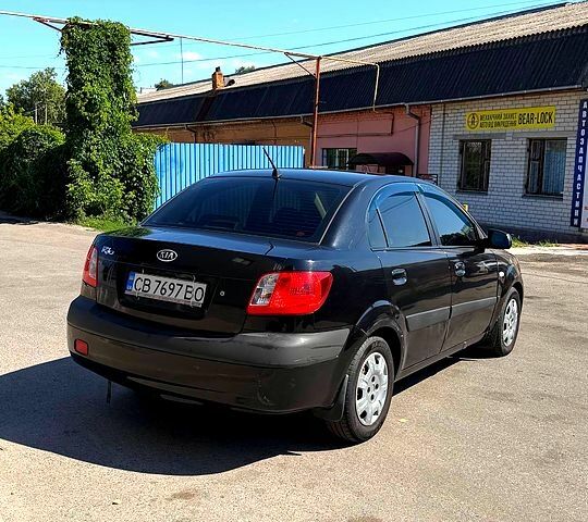 Чорний Кіа Ріо, об'ємом двигуна 1.4 л та пробігом 235 тис. км за 3200 $, фото 6 на Automoto.ua