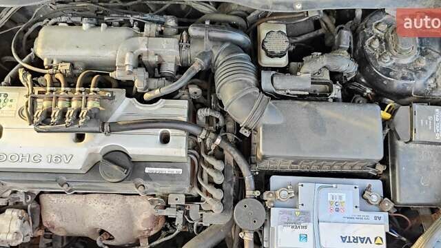 Черный Киа Рио, объемом двигателя 1.4 л и пробегом 328 тыс. км за 3450 $, фото 6 на Automoto.ua