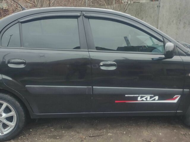 Черный Киа Рио, объемом двигателя 1.4 л и пробегом 229 тыс. км за 4200 $, фото 2 на Automoto.ua