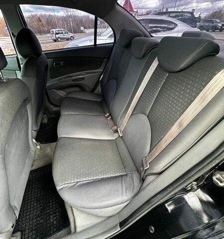 Черный Киа Рио, объемом двигателя 1.49 л и пробегом 152 тыс. км за 3500 $, фото 22 на Automoto.ua