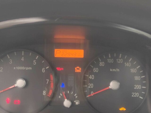 Черный Киа Рио, объемом двигателя 1.4 л и пробегом 229 тыс. км за 4200 $, фото 3 на Automoto.ua