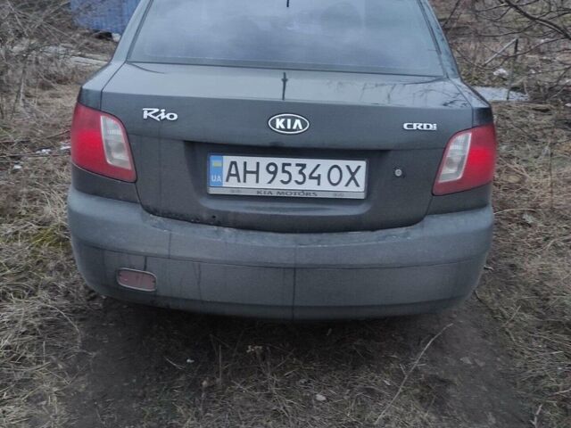 Черный Киа Рио, объемом двигателя 1.49 л и пробегом 270 тыс. км за 5000 $, фото 1 на Automoto.ua