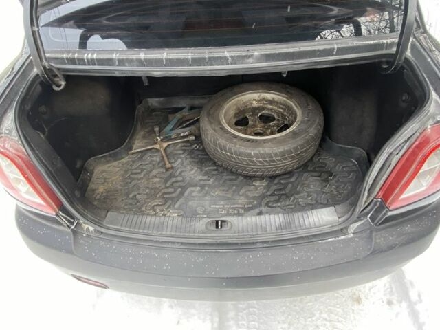 Чорний Кіа Ріо, об'ємом двигуна 1.4 л та пробігом 358 тис. км за 3750 $, фото 10 на Automoto.ua