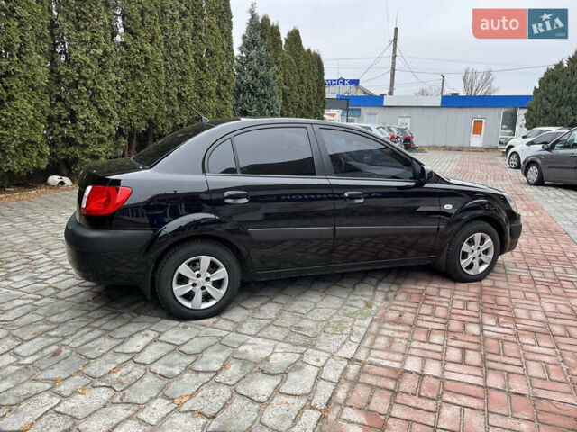 Чорний Кіа Ріо, об'ємом двигуна 1.4 л та пробігом 55 тис. км за 6800 $, фото 1 на Automoto.ua
