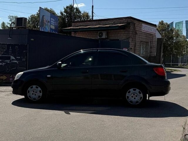 Чорний Кіа Ріо, об'ємом двигуна 1.4 л та пробігом 235 тис. км за 2900 $, фото 10 на Automoto.ua