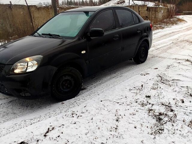 Черный Киа Рио, объемом двигателя 1.4 л и пробегом 760 тыс. км за 2500 $, фото 1 на Automoto.ua