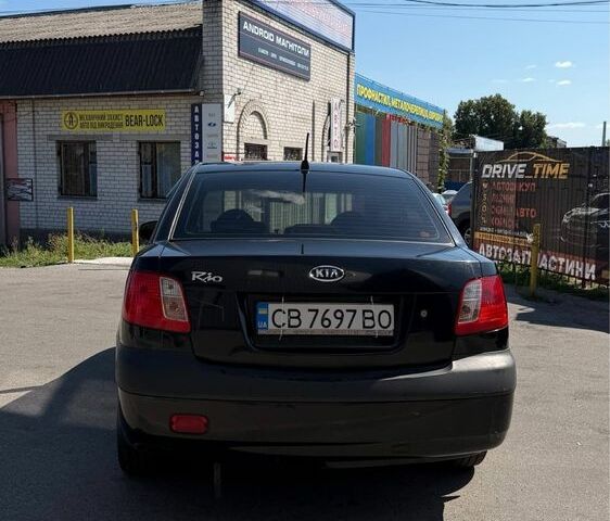 Черный Киа Рио, объемом двигателя 1.4 л и пробегом 235 тыс. км за 3200 $, фото 10 на Automoto.ua