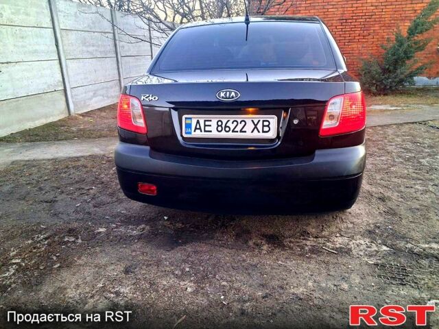 Чорний Кіа Ріо, об'ємом двигуна 1.4 л та пробігом 320 тис. км за 4400 $, фото 7 на Automoto.ua
