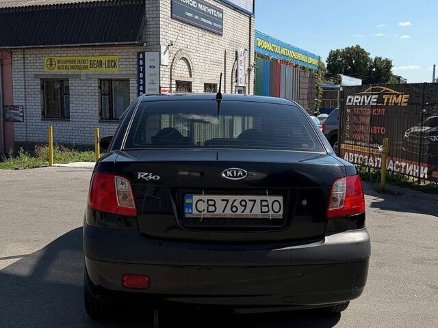 Черный Киа Рио, объемом двигателя 1.4 л и пробегом 235 тыс. км за 3200 $, фото 14 на Automoto.ua