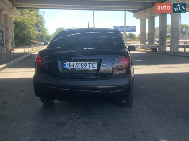 Чорний Кіа Ріо, об'ємом двигуна 1.5 л та пробігом 261 тис. км за 3700 $, фото 4 на Automoto.ua