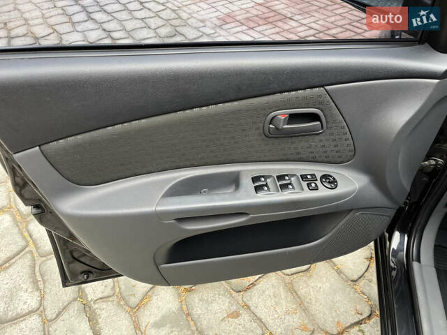 Чорний Кіа Ріо, об'ємом двигуна 1.4 л та пробігом 55 тис. км за 6800 $, фото 6 на Automoto.ua