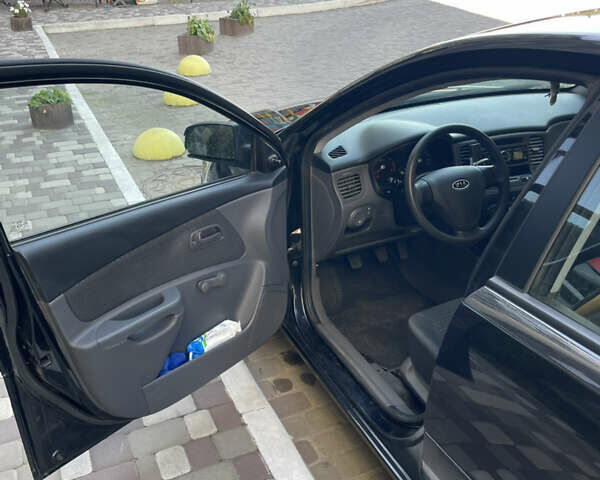Черный Киа Рио, объемом двигателя 1.4 л и пробегом 70 тыс. км за 5000 $, фото 12 на Automoto.ua