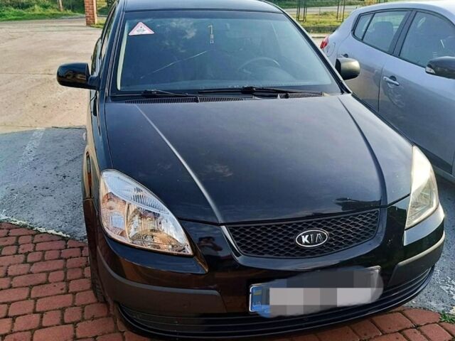 Черный Киа Рио, объемом двигателя 1.4 л и пробегом 196 тыс. км за 4200 $, фото 1 на Automoto.ua