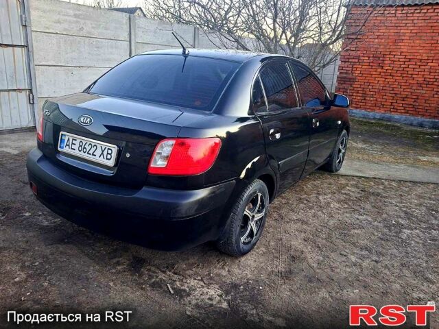Чорний Кіа Ріо, об'ємом двигуна 1.4 л та пробігом 320 тис. км за 4400 $, фото 4 на Automoto.ua