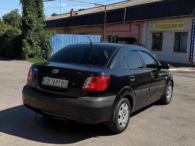Черный Киа Рио, объемом двигателя 1.4 л и пробегом 235 тыс. км за 3200 $, фото 8 на Automoto.ua