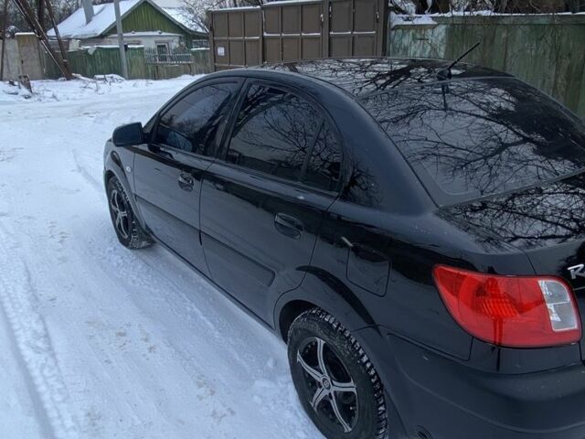 Чорний Кіа Ріо, об'ємом двигуна 1.4 л та пробігом 358 тис. км за 3750 $, фото 3 на Automoto.ua