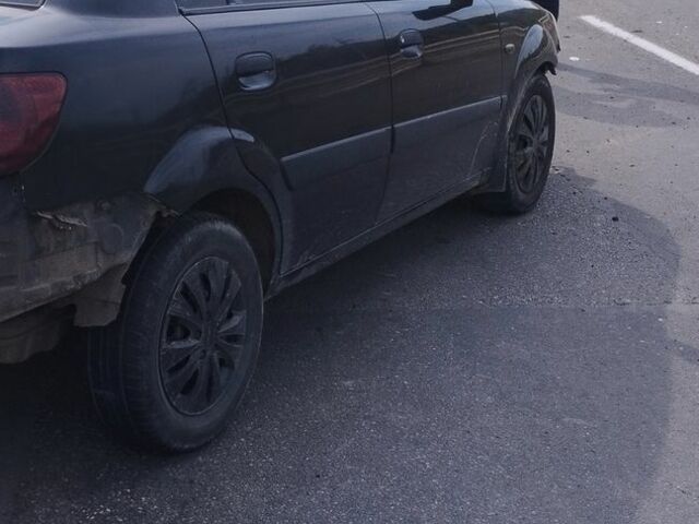 Чорний Кіа Ріо, об'ємом двигуна 1.4 л та пробігом 140 тис. км за 1200 $, фото 4 на Automoto.ua