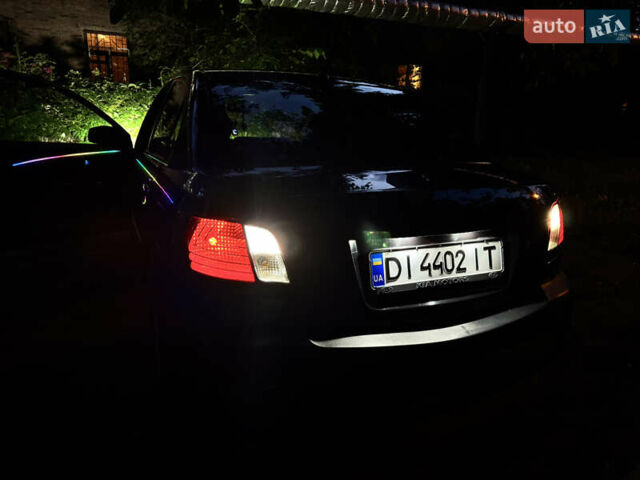 Черный Киа Рио, объемом двигателя 1.4 л и пробегом 225 тыс. км за 5000 $, фото 38 на Automoto.ua