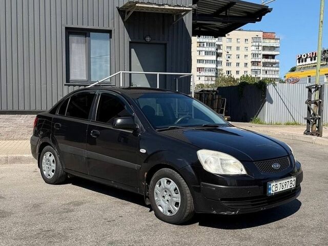 Черный Киа Рио, объемом двигателя 1.4 л и пробегом 235 тыс. км за 3200 $, фото 11 на Automoto.ua