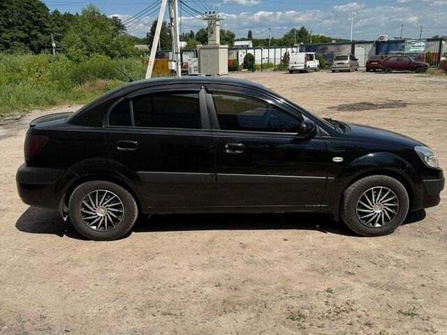 Чорний Кіа Ріо, об'ємом двигуна 1.4 л та пробігом 135 тис. км за 5500 $, фото 6 на Automoto.ua