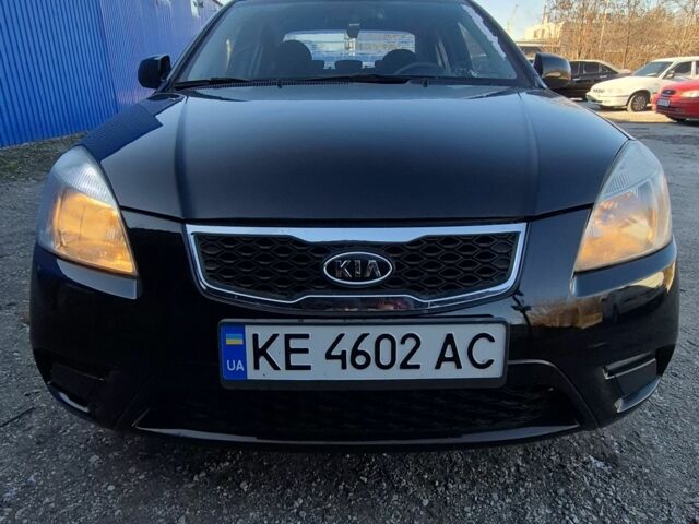 Черный Киа Рио, объемом двигателя 1.4 л и пробегом 220 тыс. км за 4400 $, фото 1 на Automoto.ua