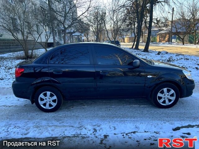 Черный Киа Рио, объемом двигателя 1.4 л и пробегом 1200 тыс. км за 5000 $, фото 6 на Automoto.ua