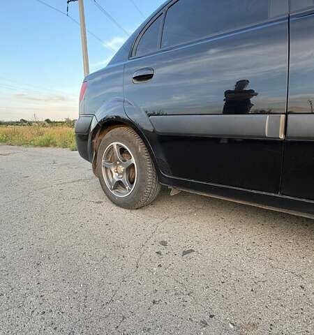 Черный Киа Рио, объемом двигателя 1.4 л и пробегом 168 тыс. км за 5600 $, фото 10 на Automoto.ua