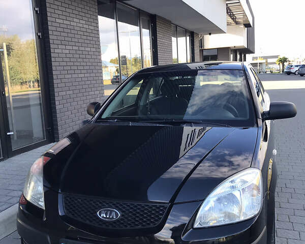 Черный Киа Рио, объемом двигателя 1.4 л и пробегом 291 тыс. км за 5500 $, фото 7 на Automoto.ua