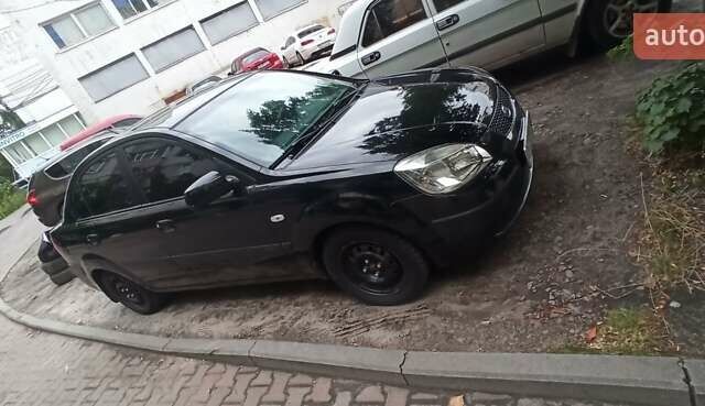 Чорний Кіа Ріо, об'ємом двигуна 1.4 л та пробігом 260 тис. км за 3800 $, фото 5 на Automoto.ua