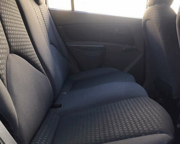 Черный Киа Рио, объемом двигателя 1.4 л и пробегом 291 тыс. км за 5500 $, фото 18 на Automoto.ua