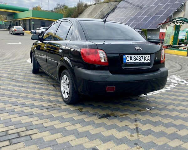 Черный Киа Рио, объемом двигателя 1.4 л и пробегом 152 тыс. км за 4600 $, фото 2 на Automoto.ua