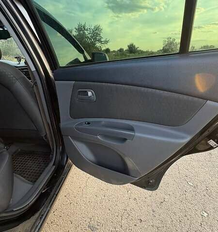 Черный Киа Рио, объемом двигателя 1.4 л и пробегом 168 тыс. км за 5600 $, фото 9 на Automoto.ua