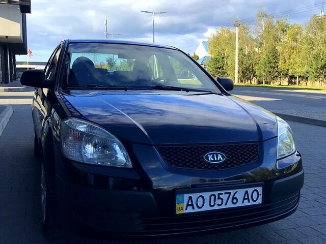 Чорний Кіа Ріо, об'ємом двигуна 1.4 л та пробігом 291 тис. км за 4200 $, фото 2 на Automoto.ua