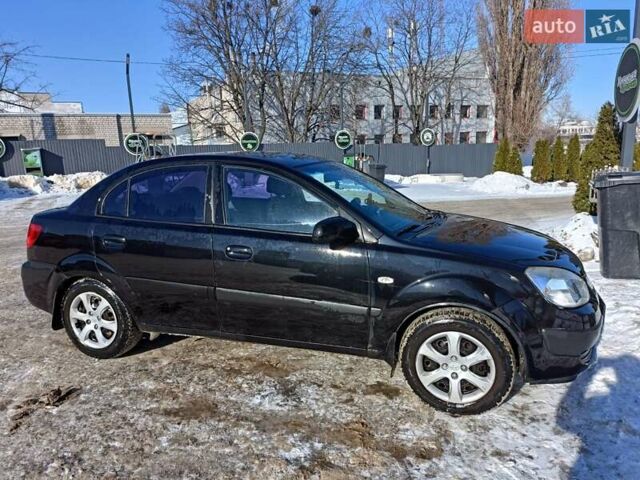 Черный Киа Рио, объемом двигателя 1.4 л и пробегом 259 тыс. км за 4500 $, фото 1 на Automoto.ua