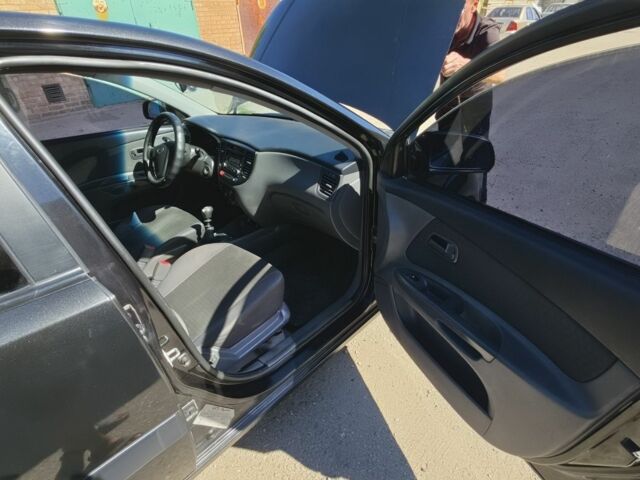 Черный Киа Рио, объемом двигателя 1.5 л и пробегом 239 тыс. км за 4498 $, фото 5 на Automoto.ua