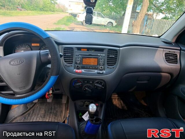 Чорний Кіа Ріо, об'ємом двигуна 1.4 л та пробігом 145 тис. км за 4300 $, фото 1 на Automoto.ua