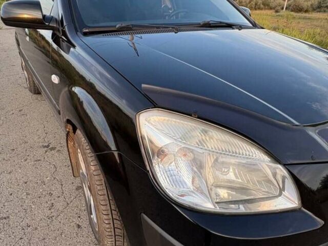 Чорний Кіа Ріо, об'ємом двигуна 1.4 л та пробігом 168 тис. км за 5500 $, фото 11 на Automoto.ua