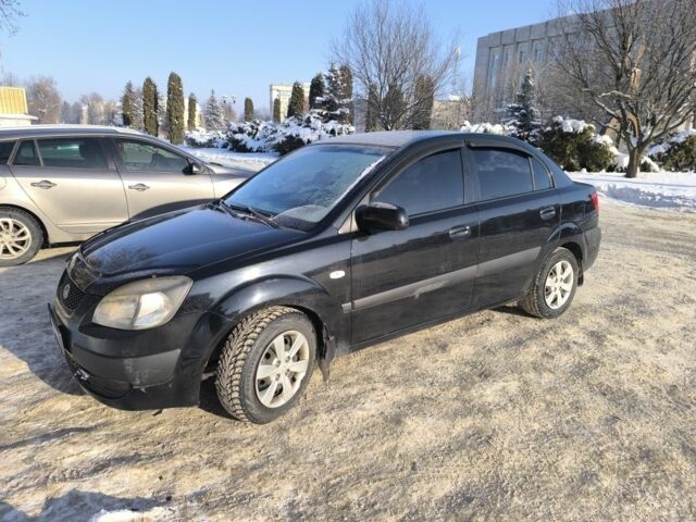 Чорний Кіа Ріо, об'ємом двигуна 1.4 л та пробігом 230 тис. км за 3750 $, фото 1 на Automoto.ua