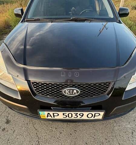 Черный Киа Рио, объемом двигателя 1.4 л и пробегом 168 тыс. км за 5600 $, фото 10 на Automoto.ua